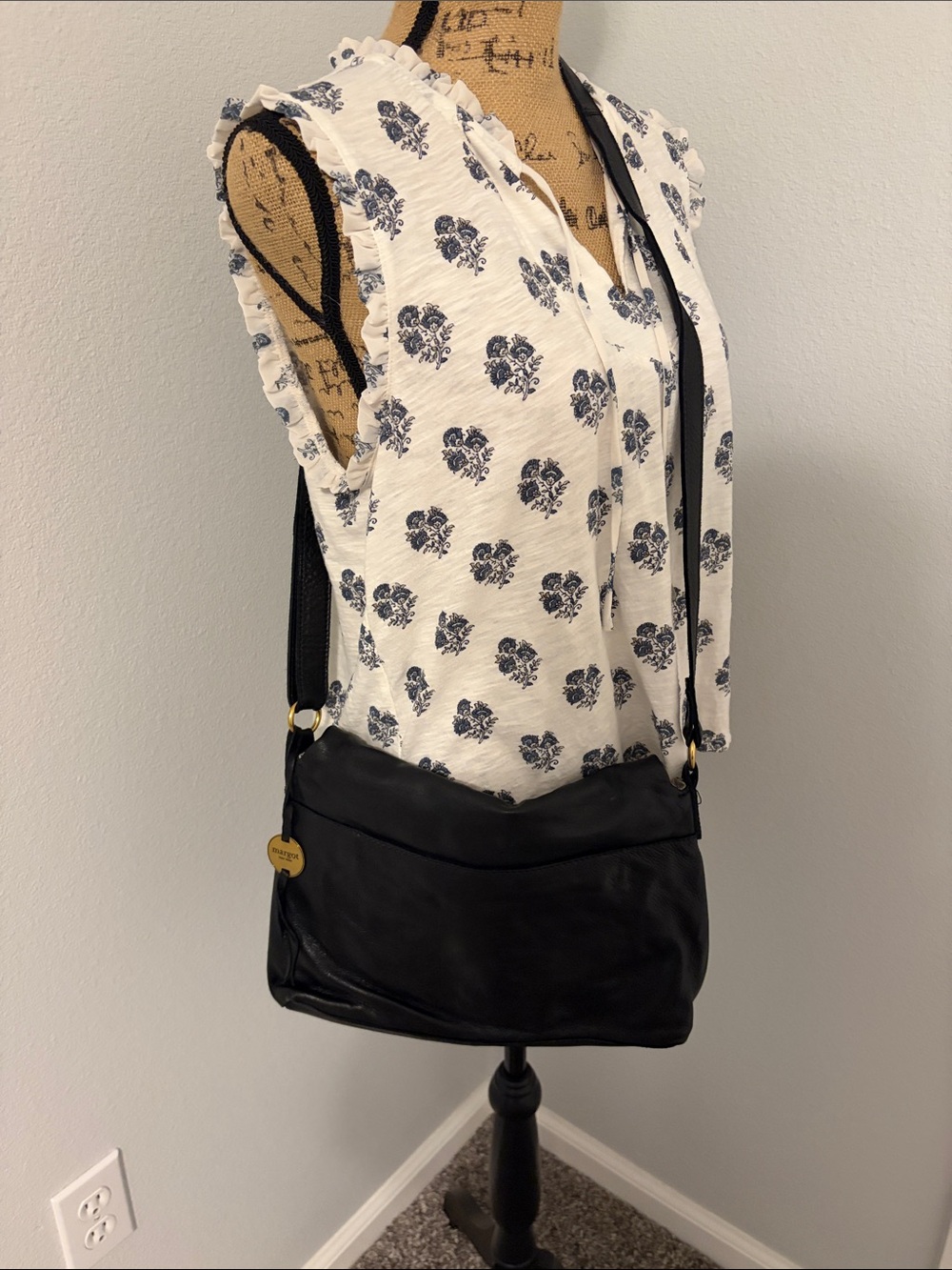 Black Leather Crossbody Bag with Gold Accent -